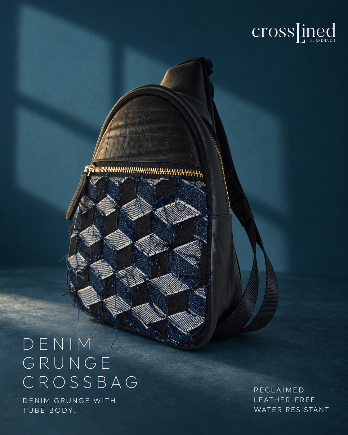 A crosslined denim grunge crossbag shown at an angle against a dark blue textured background. The bag features a dark charcoal tyre tube top and a front panel made of woven, textured denim cubes in shades of blue, gray, and black.